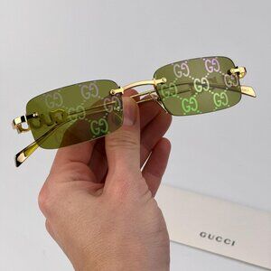 Gucci GG1808S 002 Sunglasses – Gold Rectangle Rimless Frame Green ANAGRAM Lenses